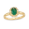 Thumbnail Image 1 of Oval Emerald and 0.04 CT. T.W. Diamond Scallop Frame Floral Ring in 10K Gold