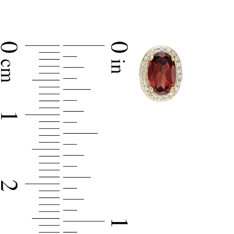 Main Image 3 of Oval Garnet and 0.088 CT. T.W. Diamond Frame Stud Earrings in 10K Gold