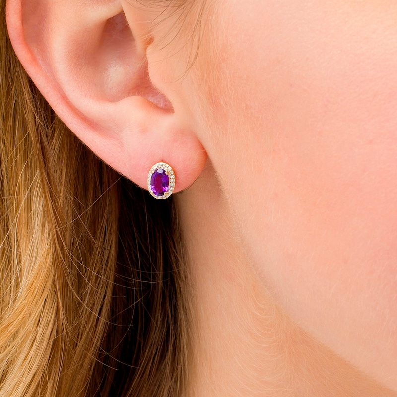 Main Image 2 of Oval Amethyst and 0.088 CT. T.W. Diamond Frame Stud Earrings in 10K Gold