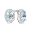 Thumbnail Image 0 of Oval Aquamarine and 0.088 CT. T.W. Diamond Frame Stud Earrings in 10K White Gold