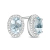 Thumbnail Image 1 of Oval Aquamarine and 0.088 CT. T.W. Diamond Frame Stud Earrings in 10K White Gold