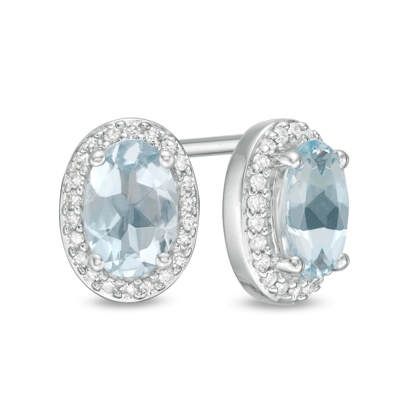 Oval Aquamarine and 0.088 CT. T.W. Diamond Frame Stud Earrings in 10K White Gold|Peoples Jewellers