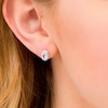 Thumbnail Image 1 of Oval Aquamarine and 0.088 CT. T.W. Diamond Frame Stud Earrings in 10K White Gold