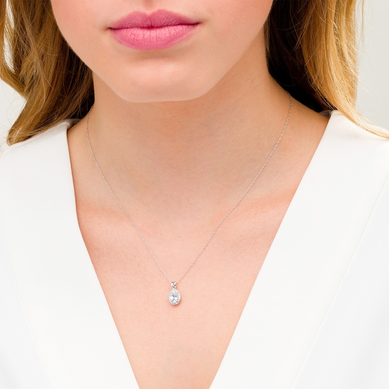 Main Image 2 of Oval Aquamarine and 0.08 CT. T.W. Diamond Frame Twisted Split Bail Pendant in 10K White Gold