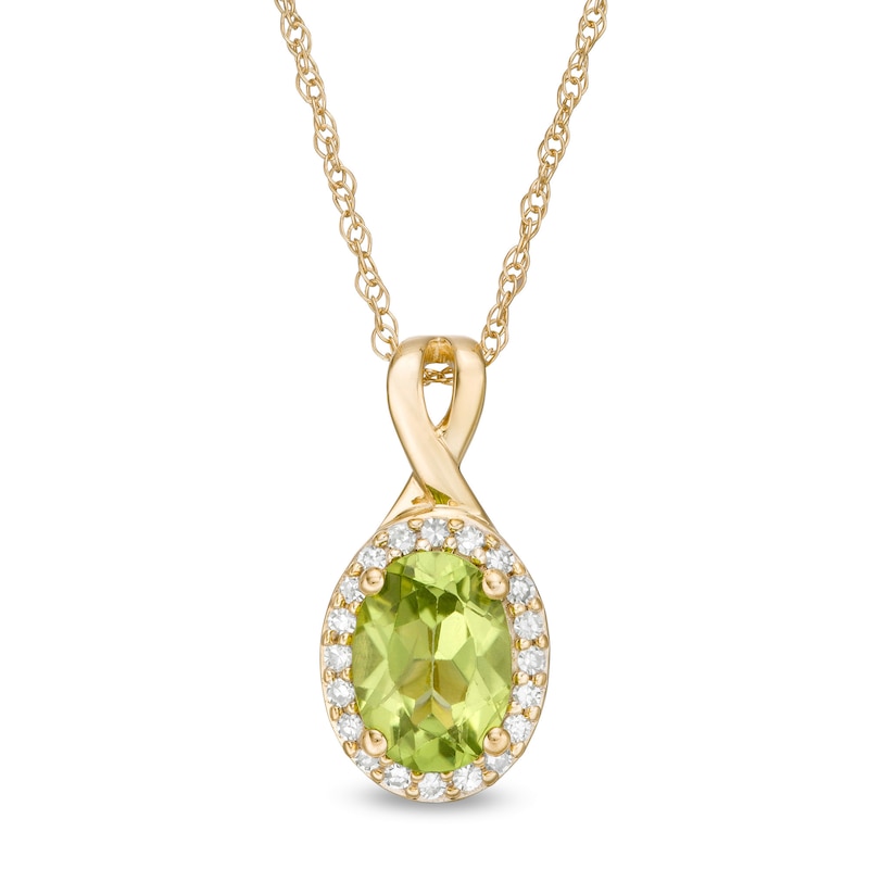 Main Image 1 of Oval Peridot and 0.08 CT. T.W. Diamond Frame Twisted Split Bail Pendant in 10K Gold