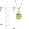 Thumbnail Image 2 of Oval Peridot and 0.08 CT. T.W. Diamond Frame Twisted Split Bail Pendant in 10K Gold