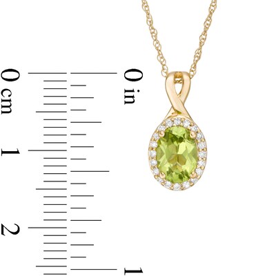 Oval Peridot and 0.08 CT. T.W. Diamond Frame Twisted Split Bail Pendant in 10K Gold