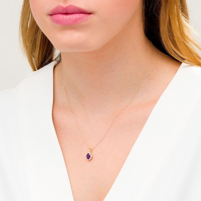 Main Image 2 of Oval Amethyst and 0.08 CT. T.W. Diamond Frame Twisted Split Bail Pendant in 10K Gold