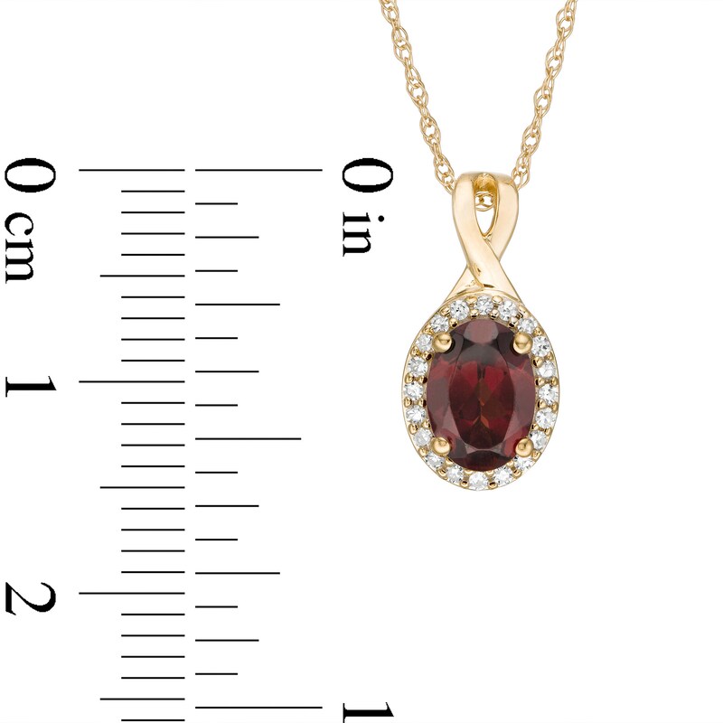 Main Image 3 of Oval Garnet and 0.08 CT. T.W. Diamond Frame Twisted Split Bail Pendant in 10K Gold