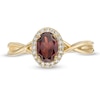 Thumbnail Image 4 of Oval Garnet and 0.08 CT. T.W. Diamond Frame Twist Shank Ring in 10K Gold