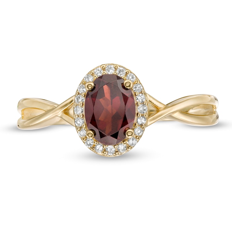 Main Image 4 of Oval Garnet and 0.08 CT. T.W. Diamond Frame Twist Shank Ring in 10K Gold
