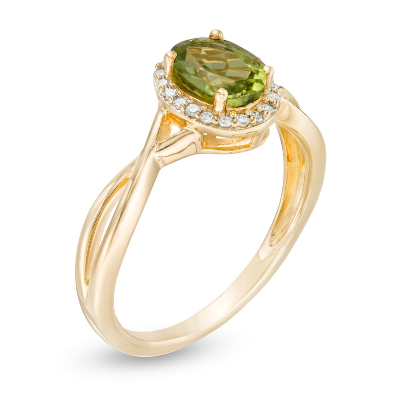 Main Image 3 of Oval Peridot and 0.08 CT. T.W. Diamond Frame Twist Shank Ring in 10K Gold