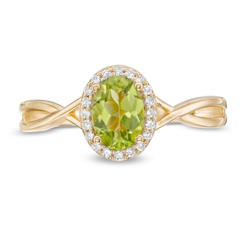 Main Image 4 of Oval Peridot and 0.08 CT. T.W. Diamond Frame Twist Shank Ring in 10K Gold