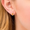Thumbnail Image 1 of Oval Citrine and 0.088 CT. T.W. Diamond Frame Stud Earrings in 10K Gold