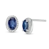 Thumbnail Image 1 of Oval Blue Sapphire and 0.088 CT. T.W. Diamond Frame Stud Earrings in 10K White Gold