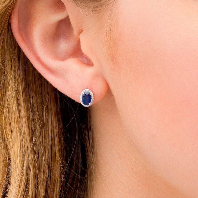 Main Image 2 of Oval Blue Sapphire and 0.088 CT. T.W. Diamond Frame Stud Earrings in 10K White Gold