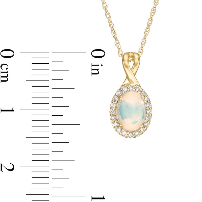 Oval Opal and 0.08 CT. T.W. Diamond Frame Twisted Split Bail Pendant in 10K Gold