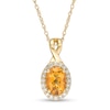 Thumbnail Image 0 of Oval Citrine and 0.08 CT. T.W. Diamond Frame Twisted Split Bail Pendant in 10K Gold