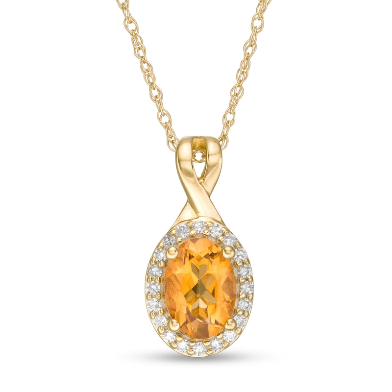 Oval Citrine and 0.08 CT. T.W. Diamond Frame Twisted Split Bail Pendant in 10K Gold