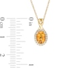 Thumbnail Image 2 of Oval Citrine and 0.08 CT. T.W. Diamond Frame Twisted Split Bail Pendant in 10K Gold