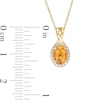 Thumbnail Image 3 of Oval Citrine and 0.08 CT. T.W. Diamond Frame Twisted Split Bail Pendant in 10K Gold