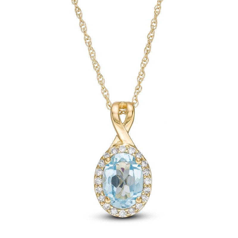 Oval Swiss Blue Topaz and 0.08 CT. T.W. Diamond Frame Twisted Split Bail Pendant in 10K Gold|Peoples Jewellers