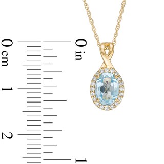 Oval Swiss Blue Topaz and 0.08 CT. T.W. Diamond Frame Twisted Split Bail Pendant in 10K Gold