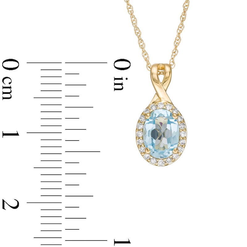 Main Image 3 of Oval Swiss Blue Topaz and 0.08 CT. T.W. Diamond Frame Twisted Split Bail Pendant in 10K Gold
