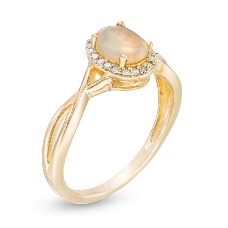 Main Image 3 of Oval Opal and 0.08 CT. T.W. Diamond Frame Twist Shank Ring in 10K Gold