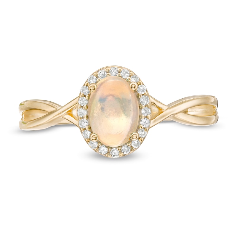 Main Image 4 of Oval Opal and 0.08 CT. T.W. Diamond Frame Twist Shank Ring in 10K Gold