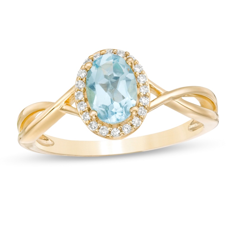 Oval Swiss Blue Topaz and 0.08 CT. T.W. Diamond Frame Twist Shank Ring in 10K Gold