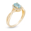 Thumbnail Image 3 of Oval Swiss Blue Topaz and 0.08 CT. T.W. Diamond Frame Twist Shank Ring in 10K Gold
