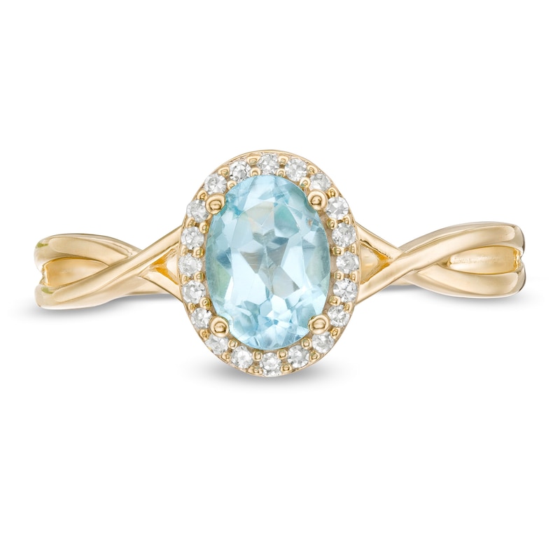 Main Image 4 of Oval Swiss Blue Topaz and 0.08 CT. T.W. Diamond Frame Twist Shank Ring in 10K Gold