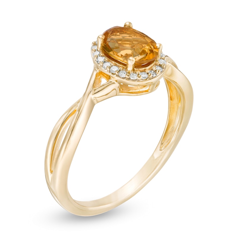 Main Image 3 of Oval Citrine and 0.08 CT. T.W. Diamond Frame Twist Shank Ring in 10K Gold