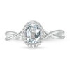 Thumbnail Image 3 of Oval Aquamarine and 0.08 CT. T.W. Diamond Frame Twist Shank Ring in 10K White Gold