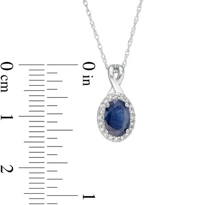 Oval Blue Sapphire and 0.08 CT. T.W. Diamond Frame Twisted Split Bail Pendant in 10K White Gold