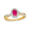 Thumbnail Image 1 of Oval Ruby and 0.20 CT. T.W. Diamond Frame Twisted Bypass Split Shank Ring in 10K Gold