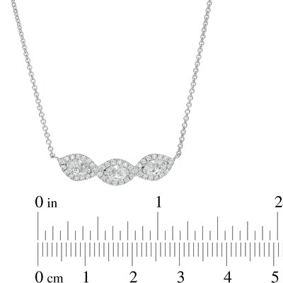 0.95 CT. T.W. Oval Diamond Past Present Future® Twist Frame Necklace in 10K White Gold