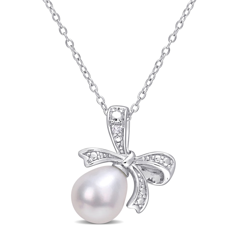 8.5-9.0mm Oval Cultured Freshwater Pearl and Diamond Accent Bow Pendant in Sterling Silver