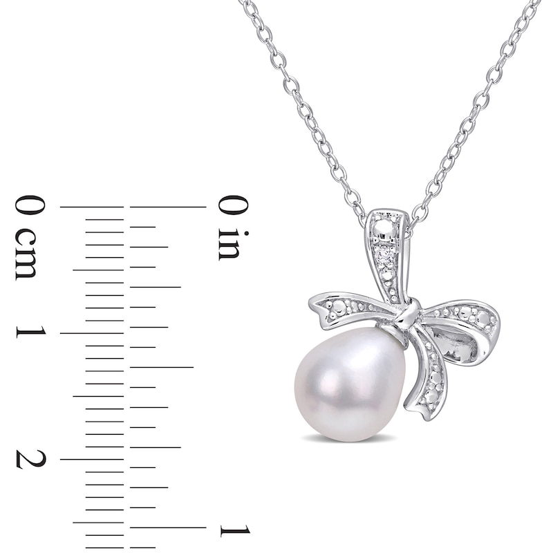 8.5-9.0mm Oval Freshwater Cultured Pearl and Diamond Accent Bow Pendant in Sterling Silver
