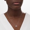 Thumbnail Image 2 of Peoples Private Collection 0.10 CT. T.W. Diamond Circle Swirl Pendant in 10K White Gold