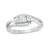 0.69 CT. T.W. Princess-Cut and Round Diamond Three Stone Bypass Ring in 10K White Gold