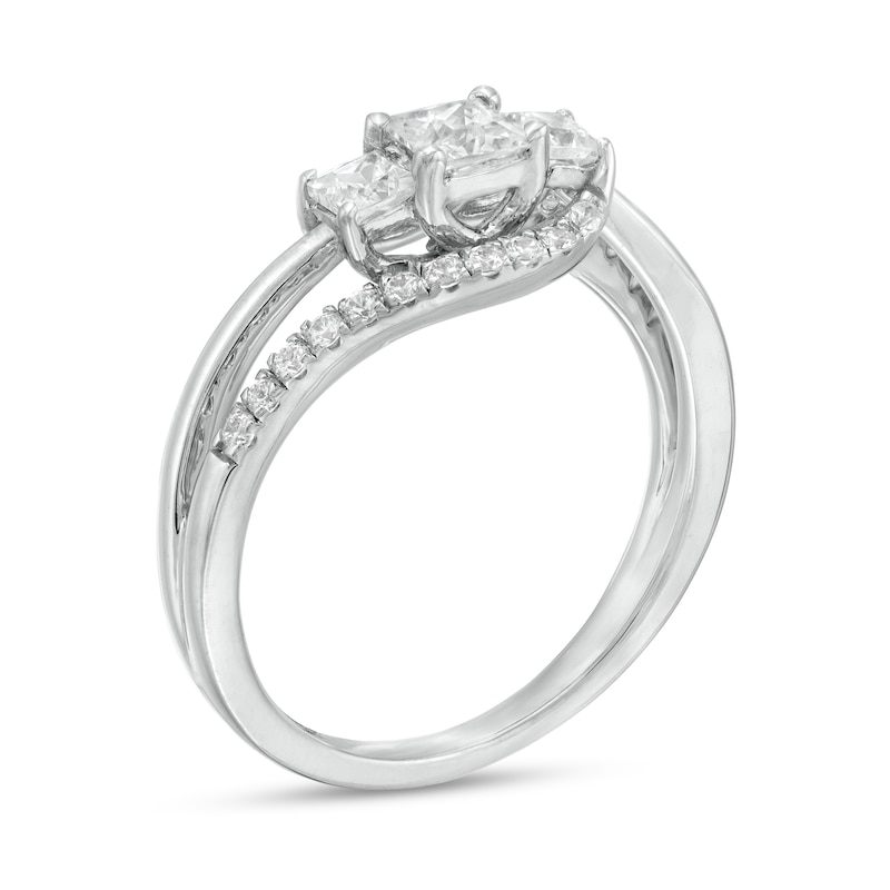 0.69 CT. T.W. Princess-Cut and Round Diamond Three Stone Bypass Ring in 10K White Gold