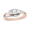 Thumbnail Image 0 of 0.69 CT. T.W. Princess-Cut and Round Diamond Three Stone Bypass Ring in 10K Rose Gold