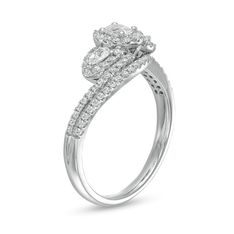 Main Image 3 of 0.69 CT. T.W. Oval Diamond Frame Past Present Future® Bypass Ring in 10K White Gold