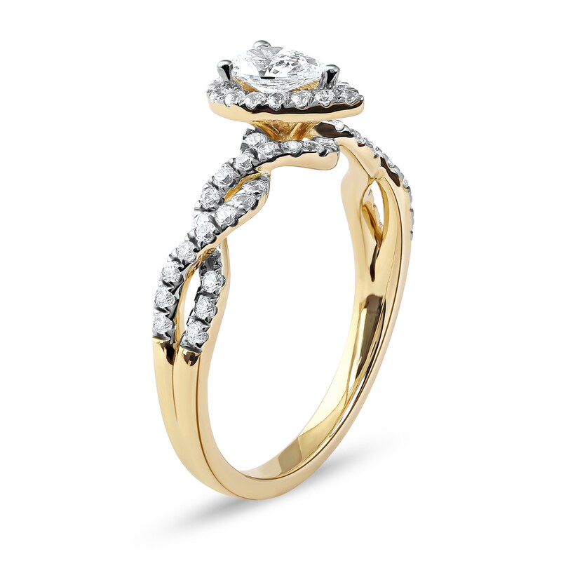 Main Image 2 of 0.75 CT. T.W. Pear-Shaped Diamond Frame Twist Shank Engagement Ring in 10K Gold (I/I1)