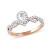 Thumbnail Image 0 of 0.75 CT. T.W. Pear-Shaped Diamond Frame Twist Shank Engagement Ring in 10K Rose Gold (I/I1)