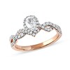 Thumbnail Image 0 of 0.75 CT. T.W. Pear-Shaped Diamond Frame Twist Shank Engagement Ring in 10K Rose Gold (I/I1)