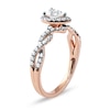 Thumbnail Image 1 of 0.75 CT. T.W. Pear-Shaped Diamond Frame Twist Shank Engagement Ring in 10K Rose Gold (I/I1)