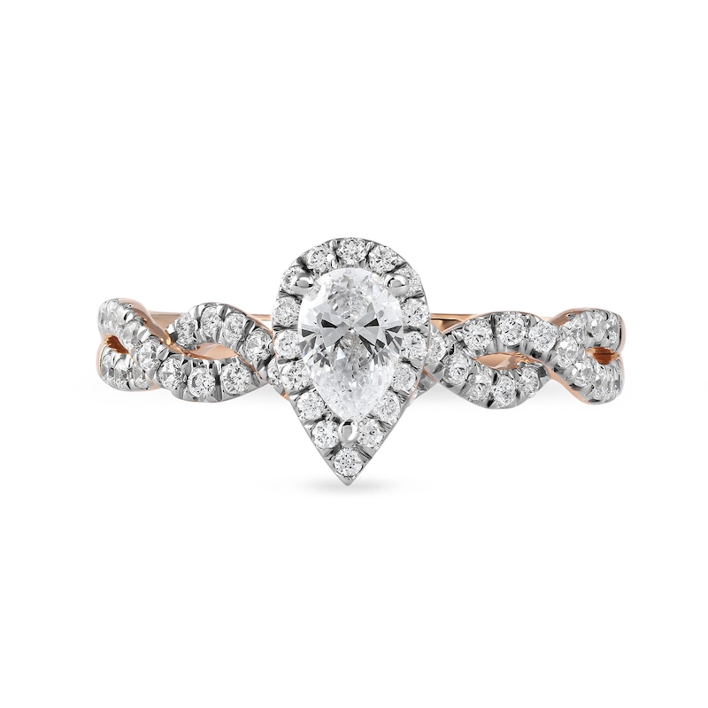 0.75 CT. T.W. Pear-Shaped Diamond Frame Twist Shank Engagement Ring in 10K Rose Gold (I/I1)